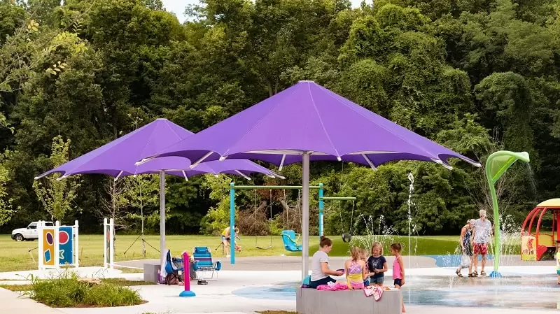 Anchor Industries purple shade umbrella at children’s splash pad