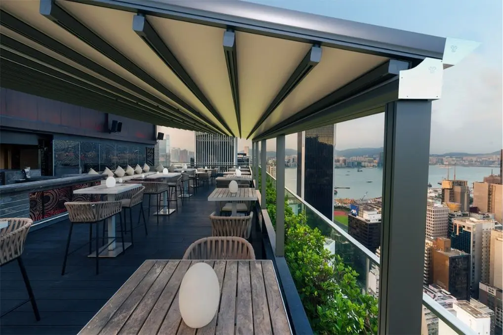 Anchor Industries retractable pergola system on rooftop terrace