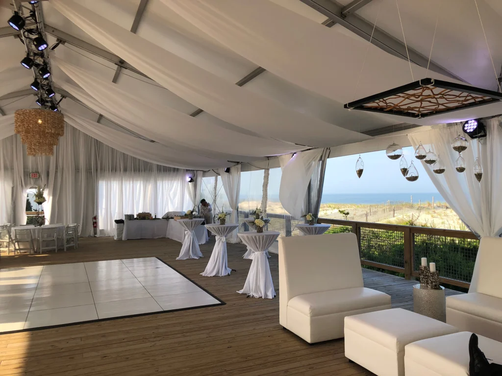 Interior of Anchor Industries wedding tent with drapery and seating