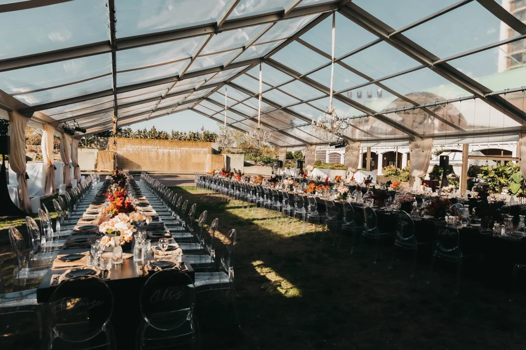 Community gathering under Anchor Industries clear span event tent