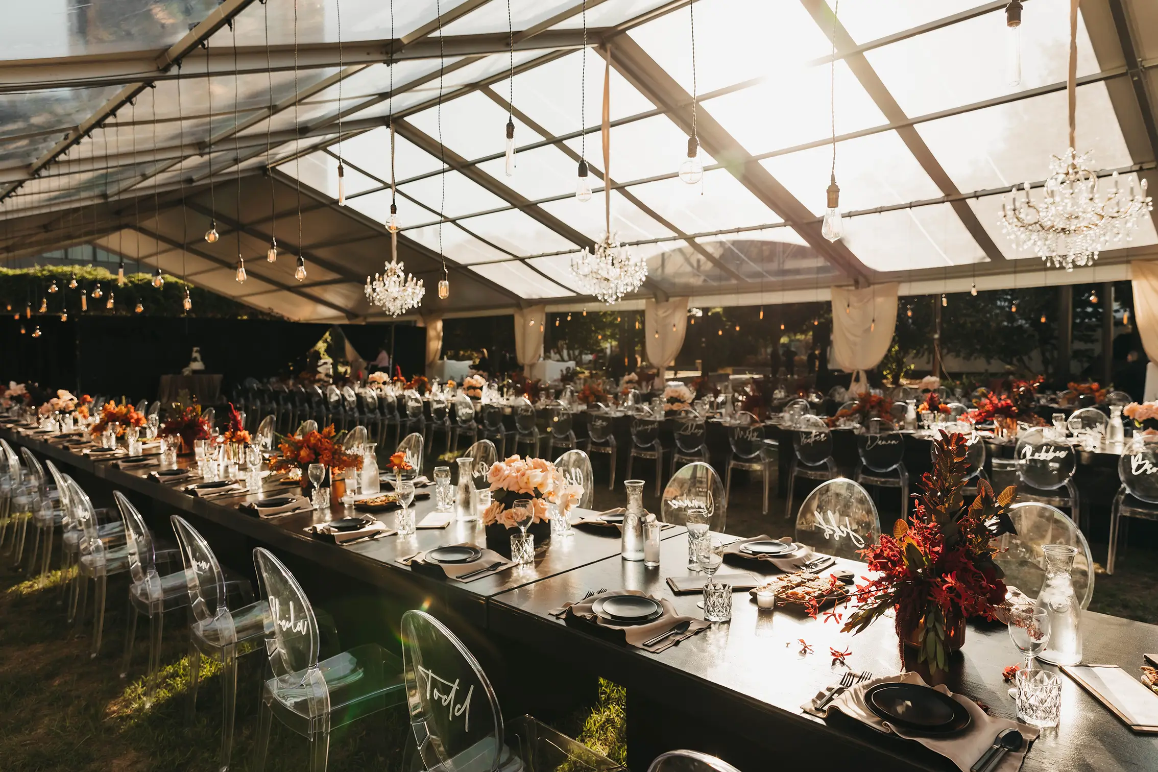 Wedding reception under transparent Anchor Industries clear span tent