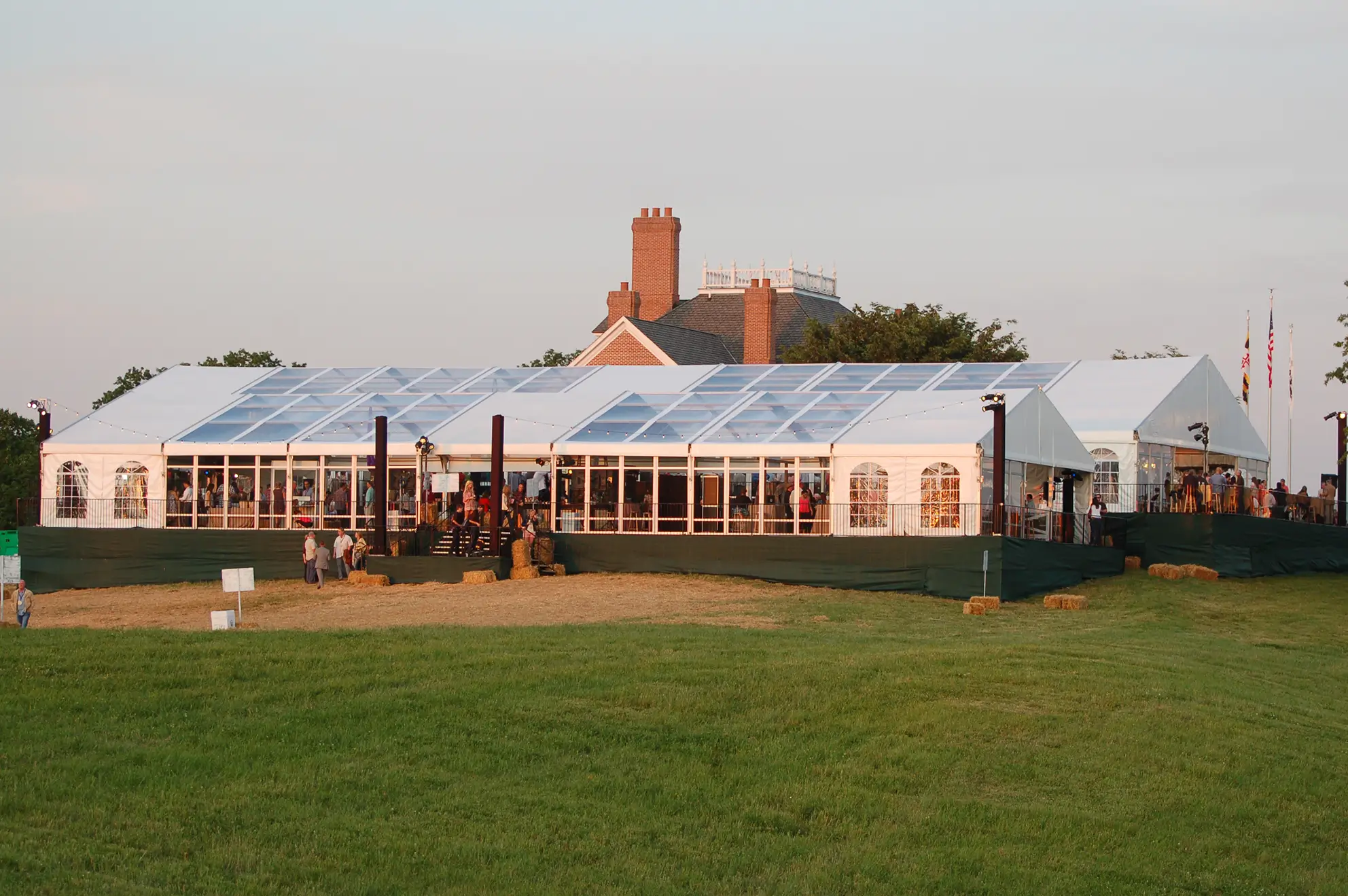 Large white event tent by Anchor Industries at outdoor venue