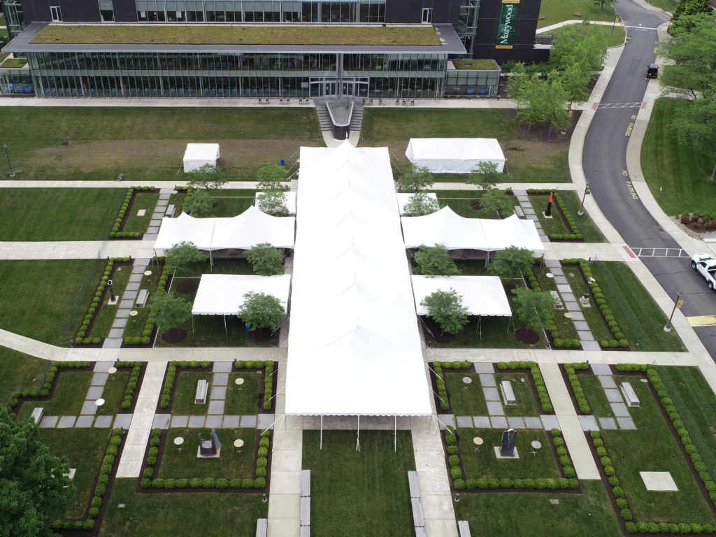 Anchor Industries event tents arranged in rows outside corporate building