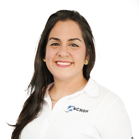 Portrait of Anchor Industries female employee in branded shirt