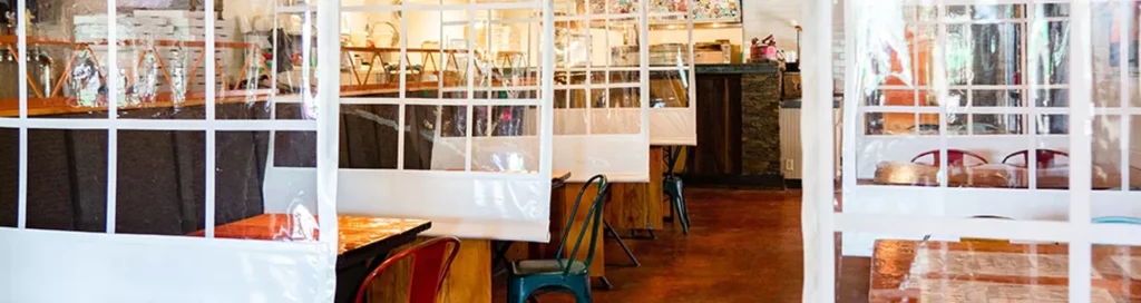 Anchor Industries restaurant partition panels separating dining tables
