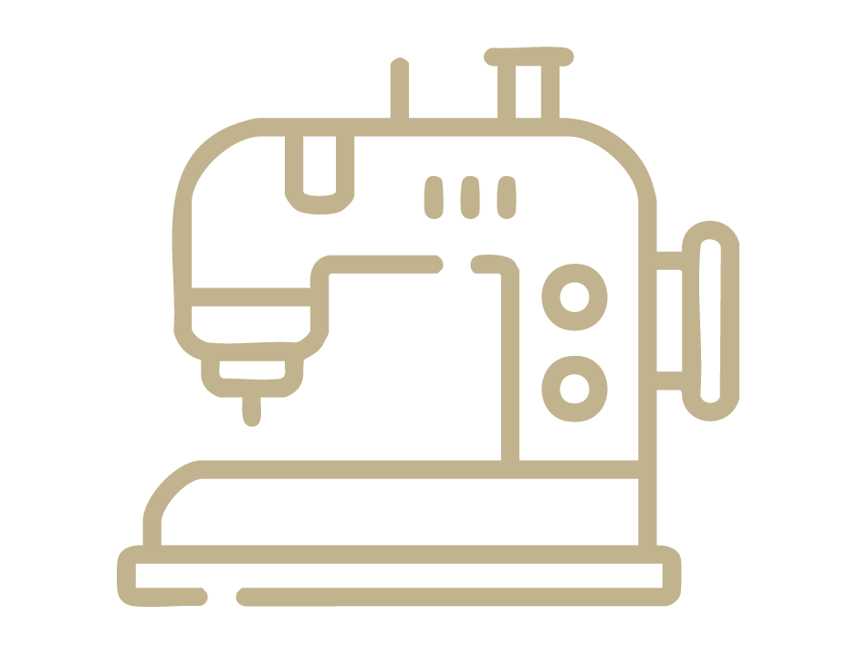 Gold icon of a sewing machine representing manufacturing or textile production.