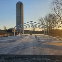 Heavy duty clear span temporary building engineered as one of Anchor's IBC 2024 compliant structures.