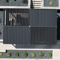 The largest louvered pergola by Anchor PERGOLAM shading a spacious luxury home patio setup.The largest louvered pergola by Anchor PERGOLAM shading a spacious luxury home patio setup.